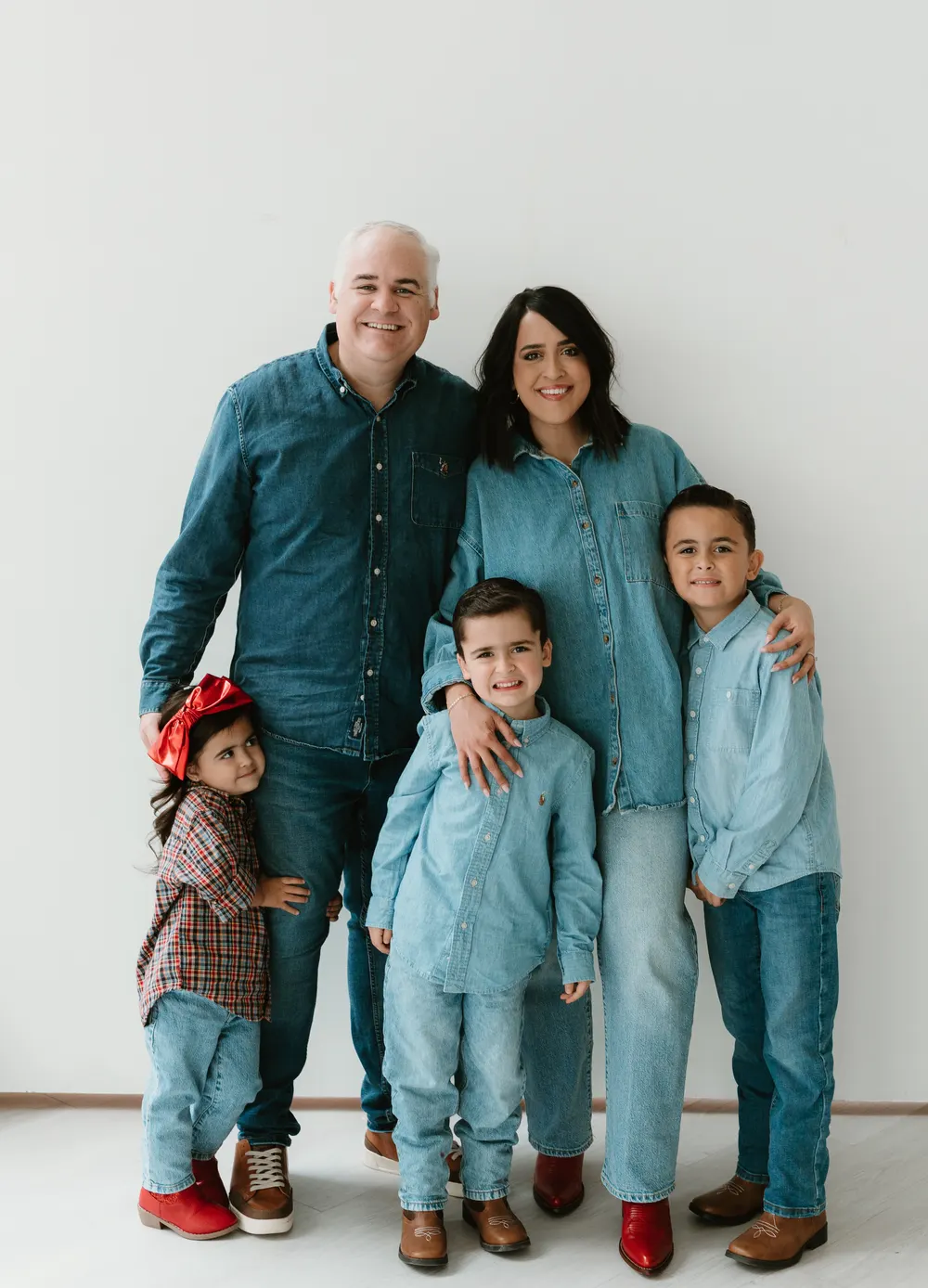 Andrew and Amanda Burchfield with their kids